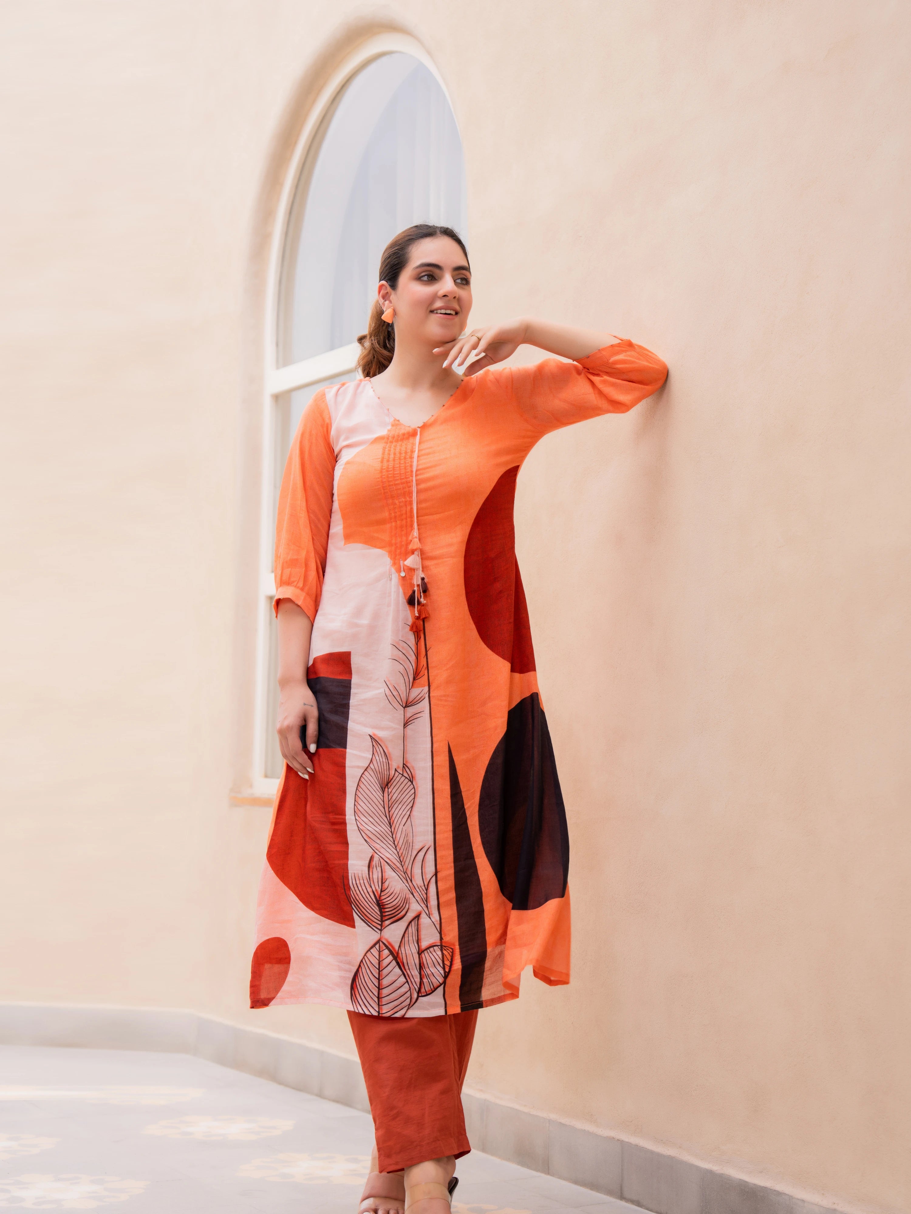 ORANGE ABSTRACT PRINTED A-LINE KURTA SET