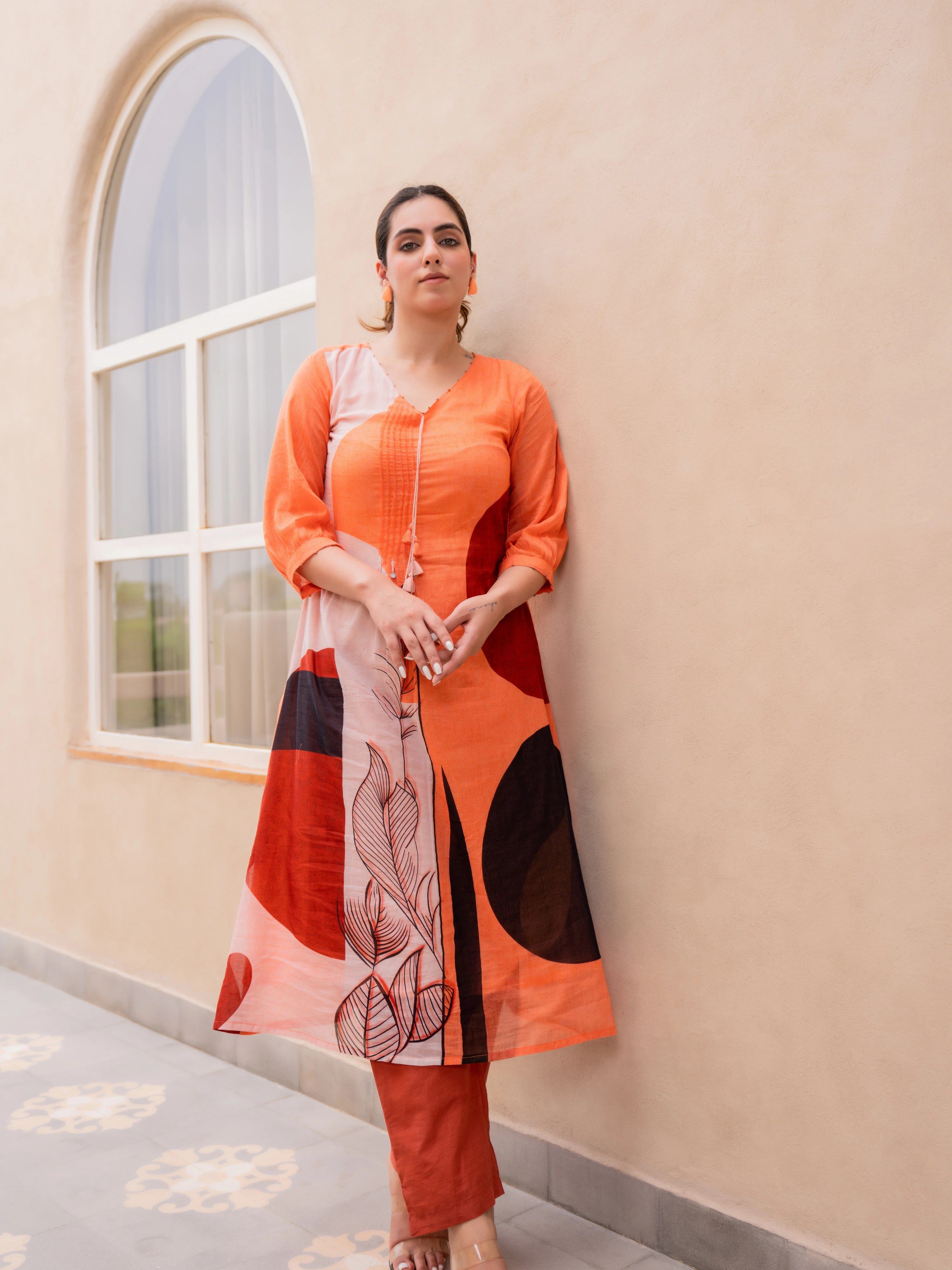 ORANGE ABSTRACT PRINTED A-LINE  KURTA SET