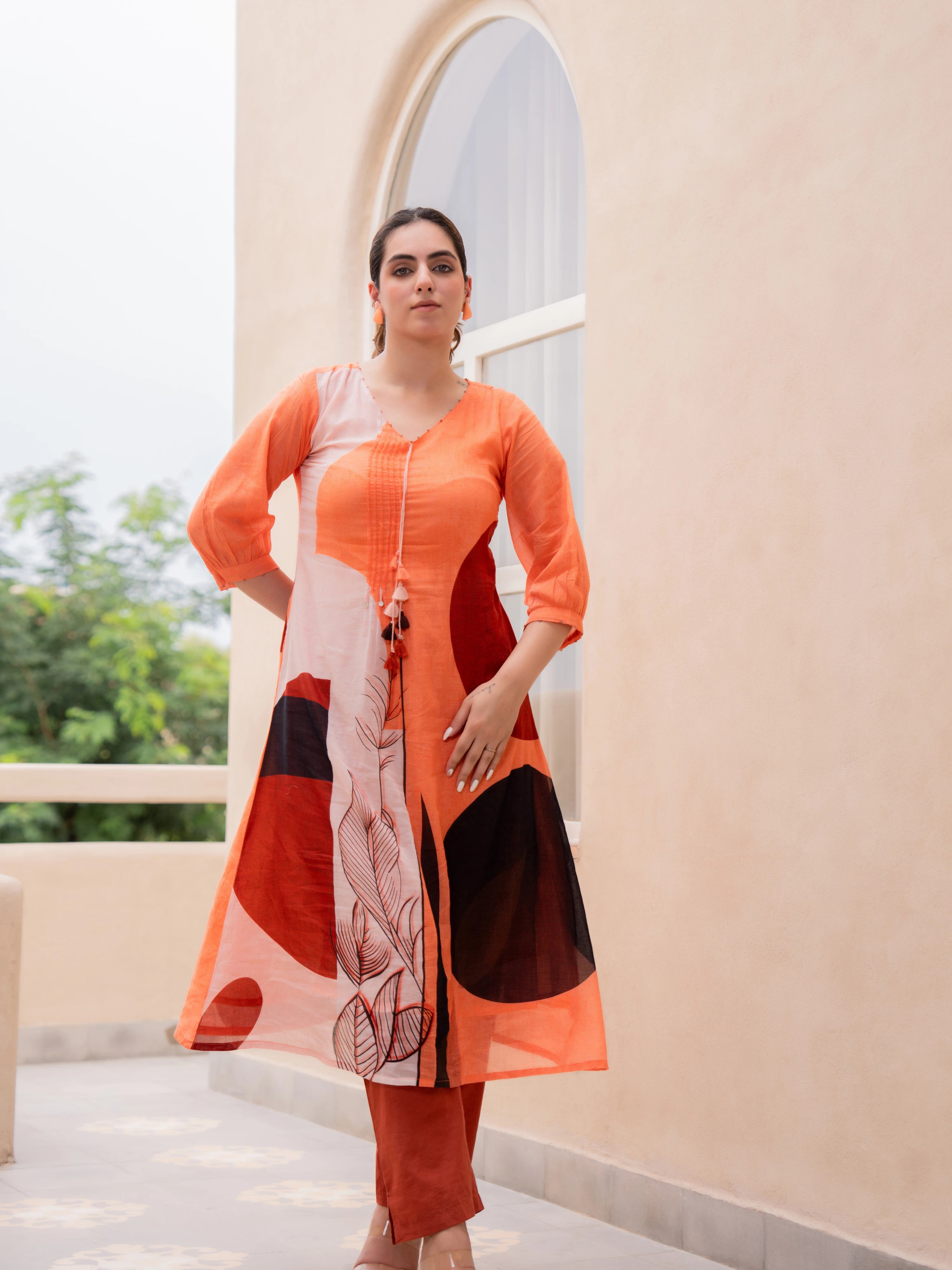 ORANGE ABSTRACT PRINTED A-LINE  KURTA SET